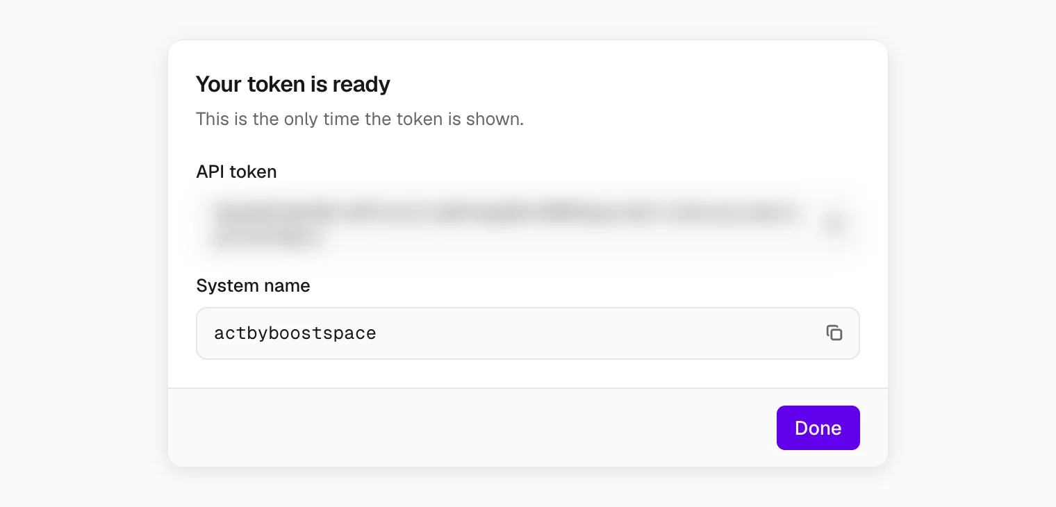 The new token, shown once, with the system name